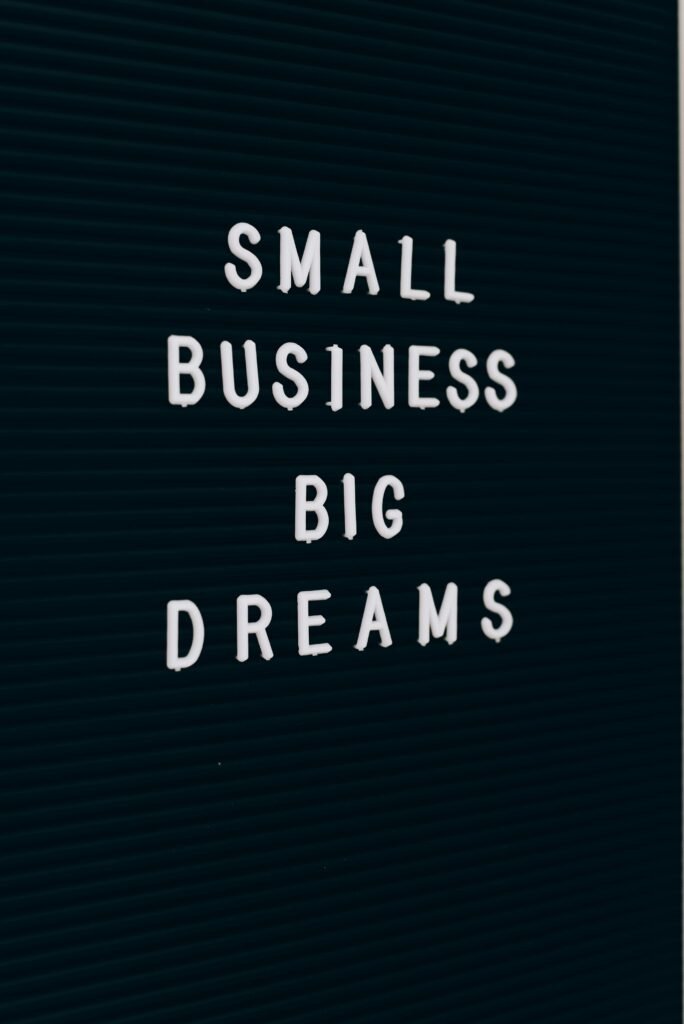Close-up of a motivational quote about small business dreams on a letter board.